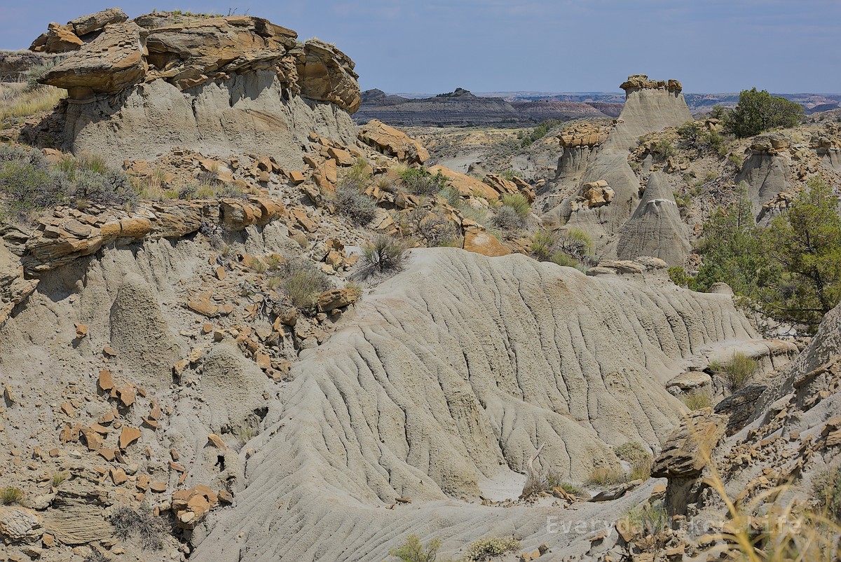 A collection of fallen capstones and a cool serpentine like mound under still in tact hoodoos.